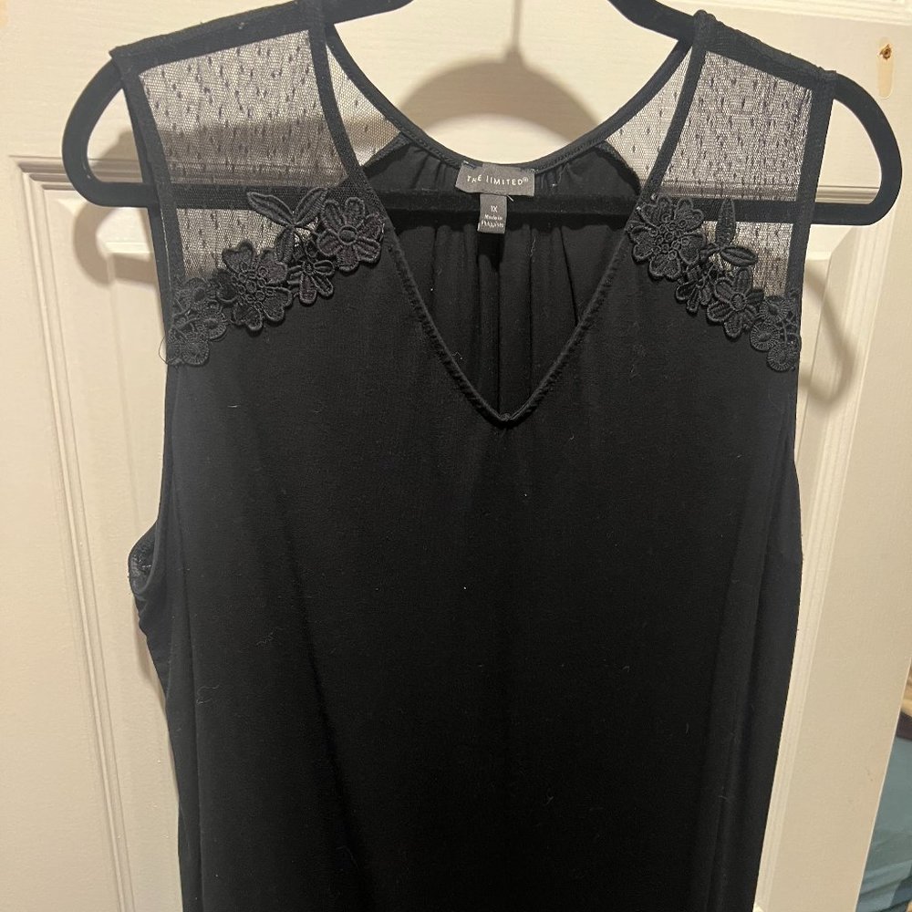 the limited black sleeveless tank